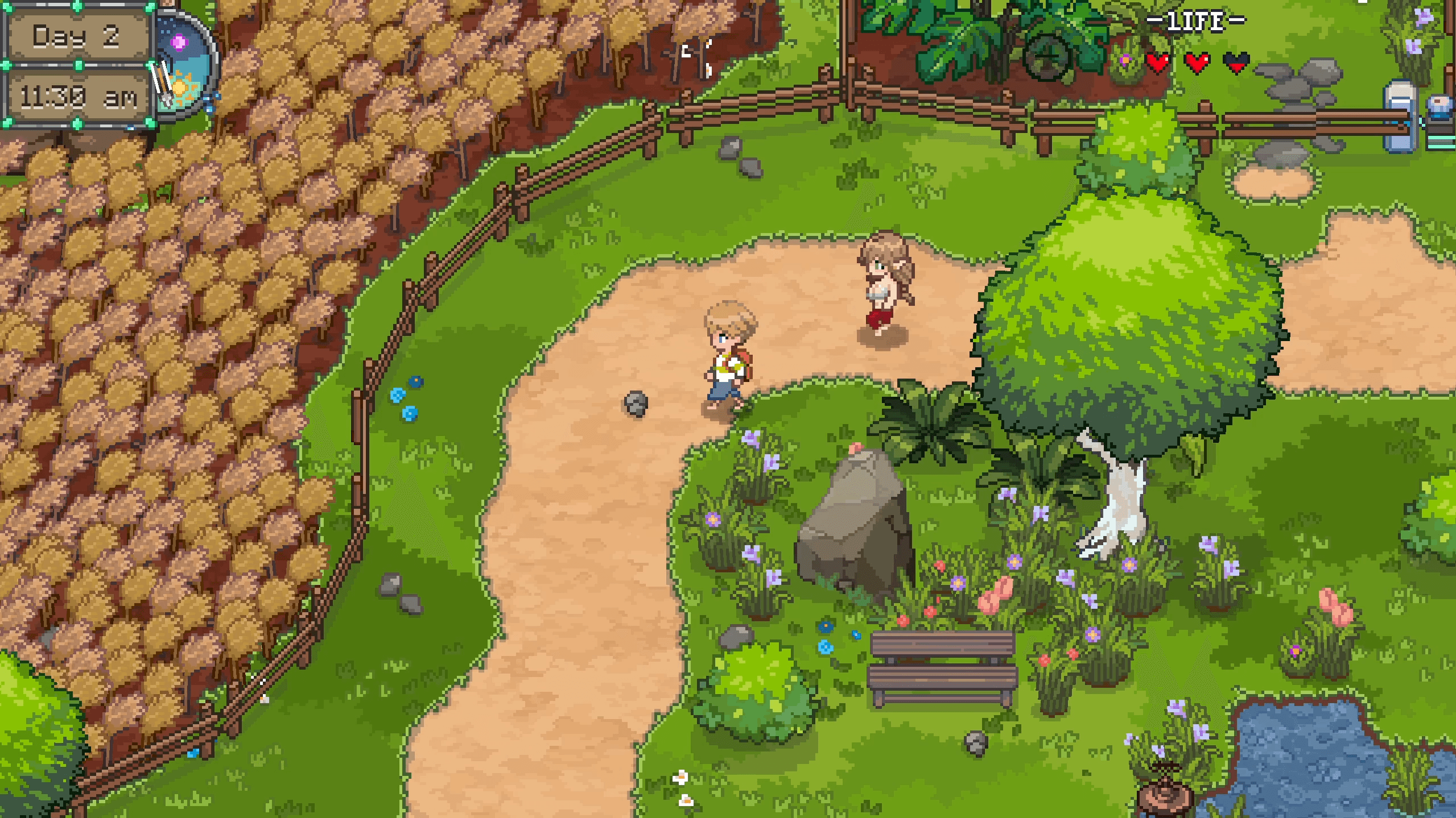 The player and a goddess standing beside a flower garden in the village