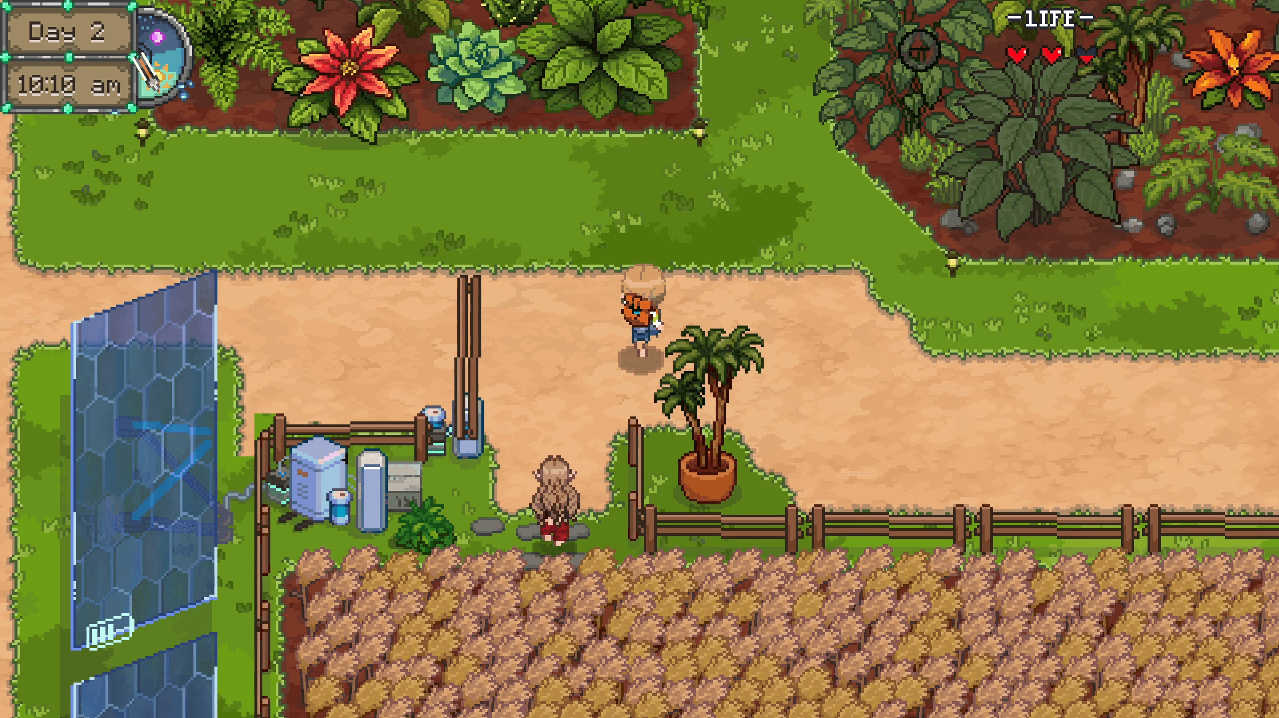A village path beside crops and a solar-powered workshop
