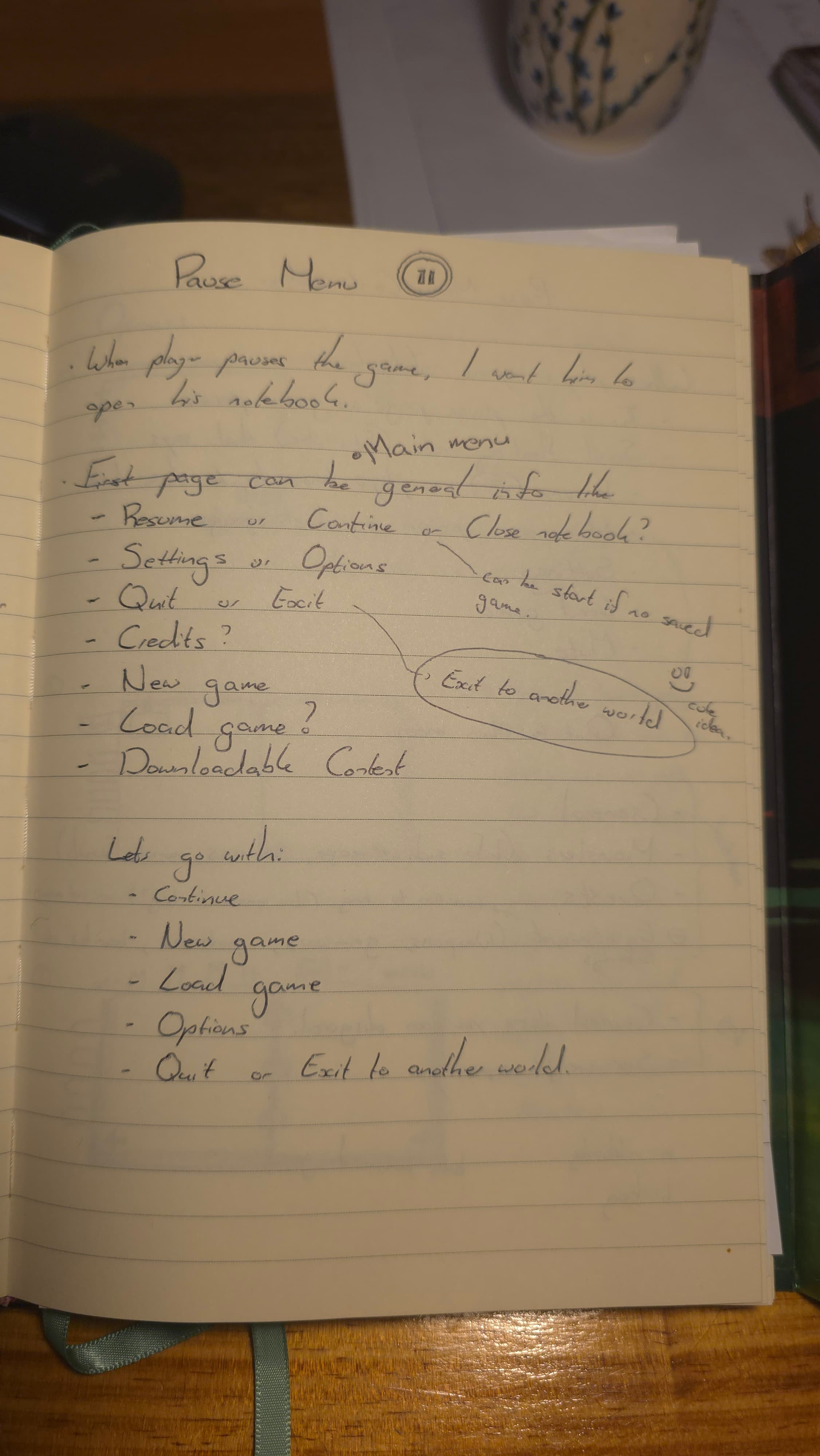 Handwritten pause-menu design notes with small interface sketches